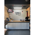 (2) Industrial Guard Pendant Light, 400-Barn Red Finish, SBK-Standard Black Cord, No Shade, CGG-Standard Cast Guards, CLR-Clear Glass | Photo Courtesy of Sonny’s BBQ Restaurant