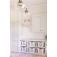 Primary Schoolhouse 3-Light Chandelier, Large Clear Glass, 615-Oil-Rubbed Bronze Finish, 24” Mounting Arms, 36” Stem, Standard Beehive Canopy, Triple Painted Band in 200-White | Photo Courtesy of Our Modern Antebellum