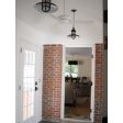 (2) 12” Brisbane, No Cap,  600-Bronze, FST-Frosted Glass, SBW-Standard Black Cord | Photo Courtesy of Homeowner