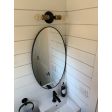 Downtown Minimalist Double Sconce,  Mounting in 100-Black, Cup in 998-Natural Weathered Brass, (2) Victorian 40W Edison Bulbs | Photo Courtesy of John Colaneri