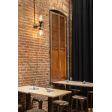 Atomic Topless Double Industrial Guard Sconce, 105-Textured Black, CGG-Standard Cast Guard, Ribbed Glass | Photo Courtesy of Urban Putt and Visual Interest (Note: Product is CSA listed for damp location use when mounted vertically as shown)