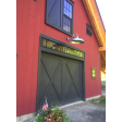 28” Original Gooseneck Light, 975-Galvanized, G22 Gooseneck Arm, TGG-Heavy Duty Guard, RIB-Ribbed Glass | Photo Courtesy of Homeowner