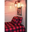 Industrial Guard Sconce, 400-Barn Red, TGG-Heavy Duty Cast Guard, Clear Glass | Photo Courtesy of Homeowner
