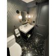 Downtown Minimalist Wooden Socket Wall Sconce, Oak, 106-Matte Black, LED Bulb | Photo Courtesy of John Colaneri