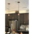 Minimalist Copper Cage Pendant, Black Cotton Twist, Wire Cage, 1910 Era 60w Edison Bulb | Customer Submission