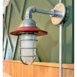 Industrial Guard Sconce, 400-Barn Red, Flared Shade, CGG-Standard Cast Guard, 975-Galvanized, FST-Frosted Glass | Photo Courtesy of The Hostel Hotel
