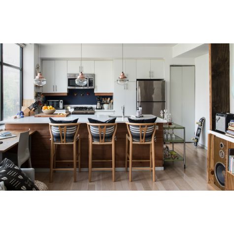 (3) Primary Schoolhouse Pendant Light, 995-Natural Raw Brass, Small Clear Glass, Triple Painted Band, 100-Black, CSBW-Black & White Cloth Cord | Photo Courtesy of Claire Esparros