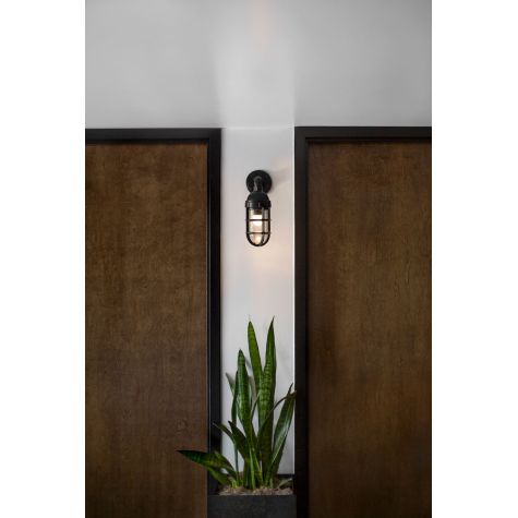 Industrial Guard Sconce, 100-Black Finish, NS-No Shade, CGG-Standard Cast Guard, CLR-Clear Glass | Photo Courtesy of Ulele Restaurant (Tampa, FL)
