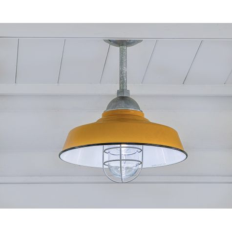 14" Rochester, 550-Porcelain Yellow, WGG-Wire Guard, 975-Galvanized, CLR-Clear Glass, Mounting in 975-Galvanized | Photo Courtesy of Taylor Newton Photography