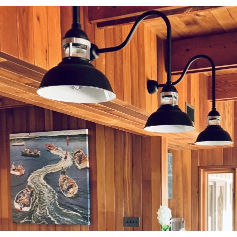 (3) 12" Outback, 105-Textured Black with 975-Galvanized Guard, RIB-Ribbed Glass, G24 Gooseneck Arm in 105-Textured Black | Photo Courtesy of Harbor Oaks and Cheryl Settle of H.I.P. Design