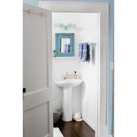 Atomic Topless Double Industrial Guard Sconce, 311-Jadite, CGG-Standard Cast Guard, CLR-Clear Glass | Photo Courtesy of Homeowner