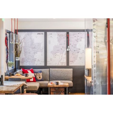 Fargo Swing Arm Sconce, 975-Galvanized, Arm in 100-Black, CSR-Red Cloth | Photo Courtesy of Mountain Modern Motel