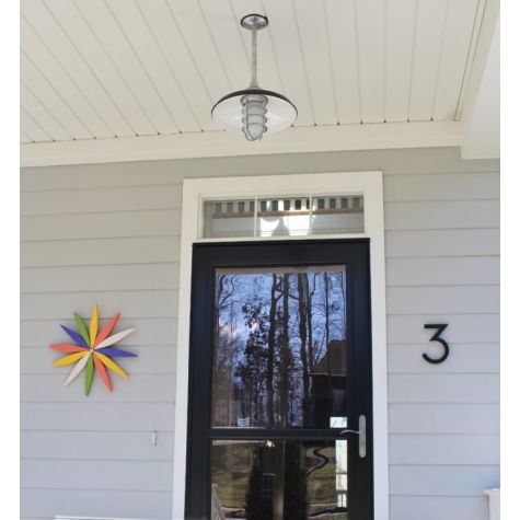 14" Bridgeport, 150-Porcelain Black, CGG-Standard Cast Guard in 975-Galvanized, FST-Frosted Glass, 12” Stem | Photo Courtesy of Homeowner