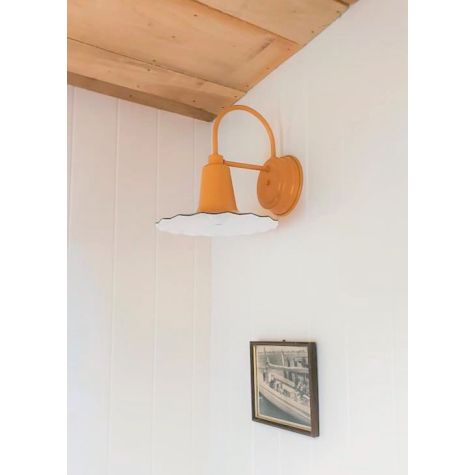 12” Seaside Wall Sconce, 550-Porcelain Yellow | Photo Courtesy of Homeowner
