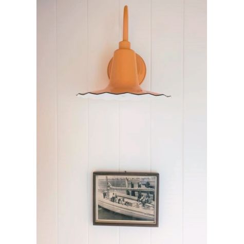 12” Seaside Wall Sconce, 550-Porcelain Yellow | Photo Courtesy of Homeowner