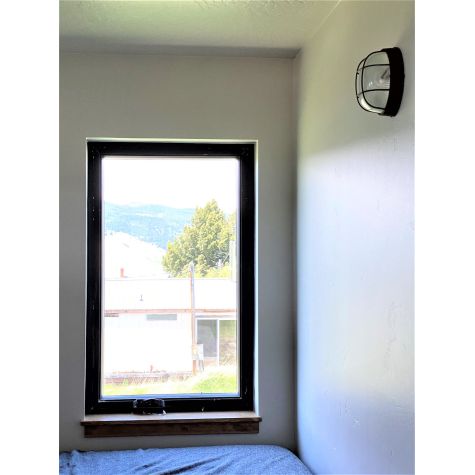 Anchorage Bulkhead Wall Mount Light Fixture Small Size, 605-Rust | Photo Courtesy of Homeowner