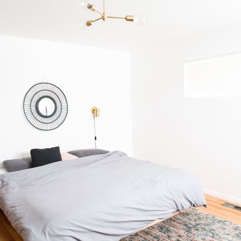 Downtown Minimalist 3-Light Chandelier, 997-Natural Raw Brass | Photo Courtesy of Homeowner