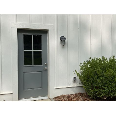Streamline Industrial Guard Sconce, 805-Charcoal Granite, Flared Shade, WGG-Wire Guard, RIB-Ribbed Glass, Dusk-to-Dawn Photocell | Photo Courtesy of Homeowner