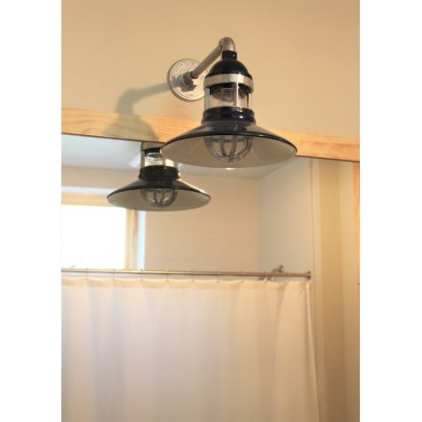 12” Wallaby, 705-Navy, No Cap, RIB-Ribbed Glass, 975-Galvanized Guard, G16 Gooseneck Arm in 975-Galvanized | Photo Courtesy of Homeowner