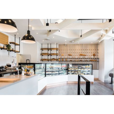 20” Wilcox, 100-Black, 4 ft of Chain in 100-Black with SBK-Standard Black Cord | Photo Courtesy of Janks Design Group, Breka Bakery, Symmetry Lighting and Christine Pienaar Photography