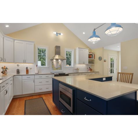 Atomic Topless Double Industrial Guard Sconce, 715-PTM Delphite Blue, WGG-Wire Guard, Frosted Glass | Photo Courtesy of Build with Coastal in Eastham, Massachusetts