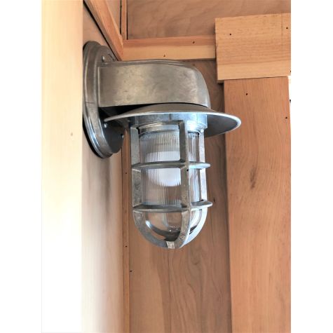 Streamline Industrial Guard Sconce, 975-Galvanized, FS-Flared Shade, TGG-Heavy Duty Cast Guard, RIB-Ribbed Glass | Photo Courtesy of Jon Gaffney