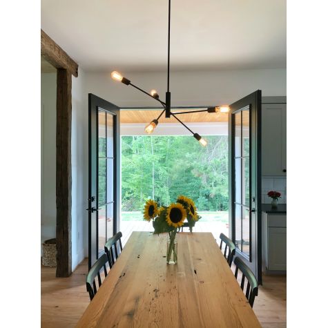 Downtown Minimalist 5-Light Chandelier, 105-Textured Black, 36in Stem, 1910 Era 40W Edison Bulbs | Photo Courtesy of Stephanie Peyton (@springofmint)