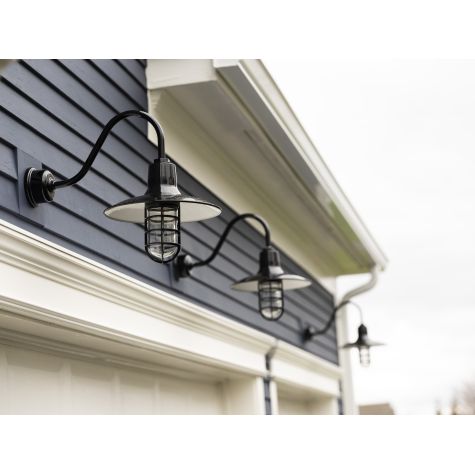 14" Dominion Nautical LED Gooseneck, 150-Black, G11 Arm, CGG- Standard Cast Guard, Clear Glass, Decorative Backing Plate | Photo Courtesy of LDD Interiors