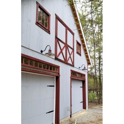 16" Brisbane LED, 106-Matte Black, G11 Arm, No Cap, 400-Barn Red, Clear Glass | Photo Courtesy of Homeowner