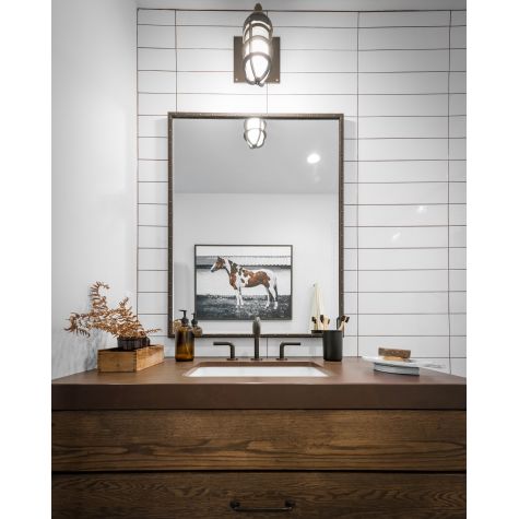 Industrial Guard Sconce, 600-Bronze, Heavy Duty Cast Guard, Ribbed Glass | Photo Courtesy of Dion Williams
