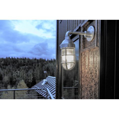 Industrial Guard Sconce, 975-Galvanized, Heavy Cast Guard, Ribbed Glass | Photo Courtesy of Niko Nolan