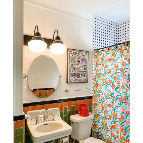 Primary 2-Light Schoolhouse Vanity, Small Opaque, 100-Black | Photo Courtesy of Hector Sanchez