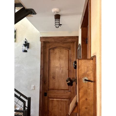 Flush Mount LED Guard Sconce, 605-Rust, CGG-Standard Cast Guard, FST-Frosted Glass | Photo Courtesy of Customer